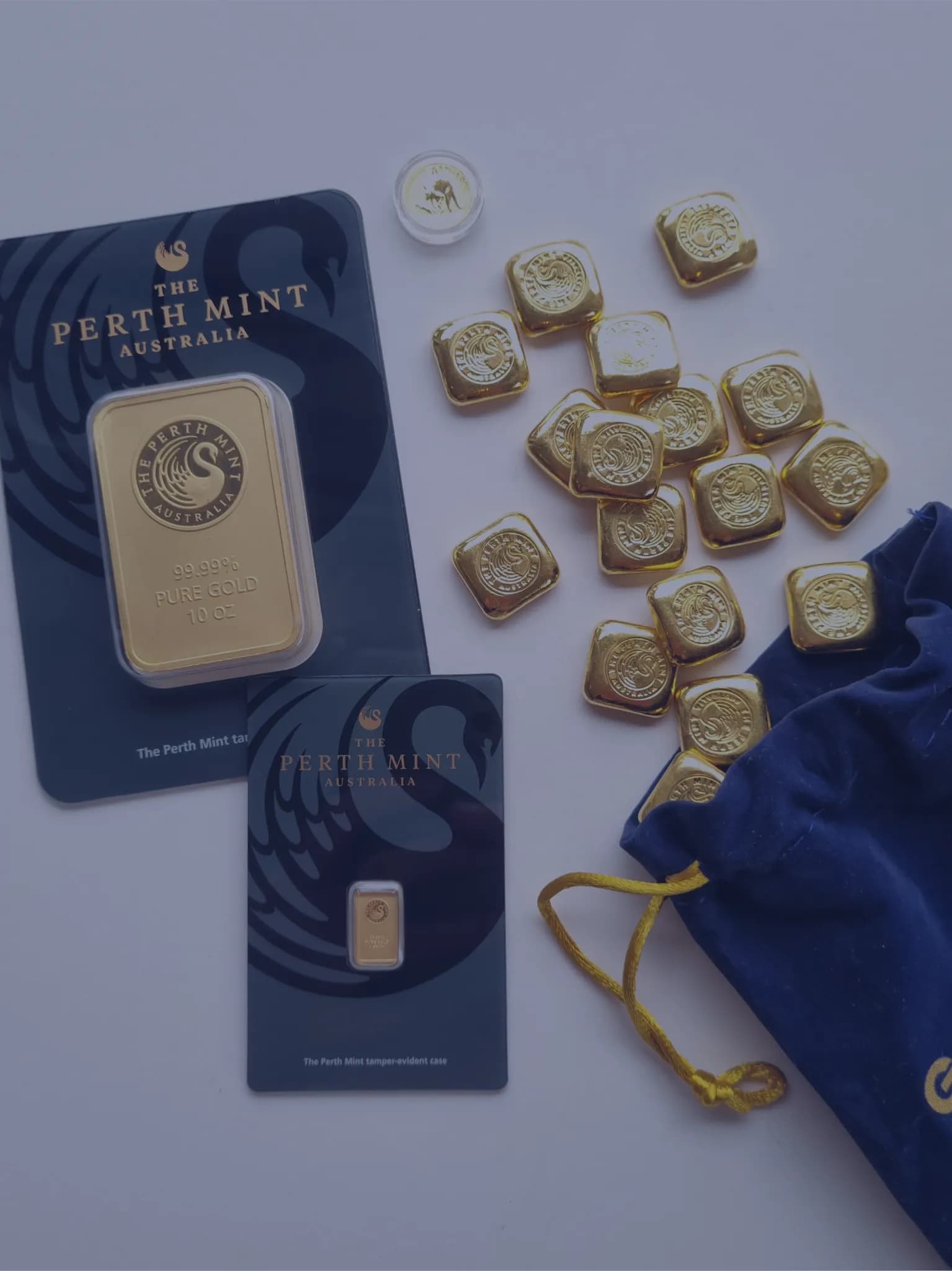 Perth Mint gold bars and cast gold with a The Gold House® pouch