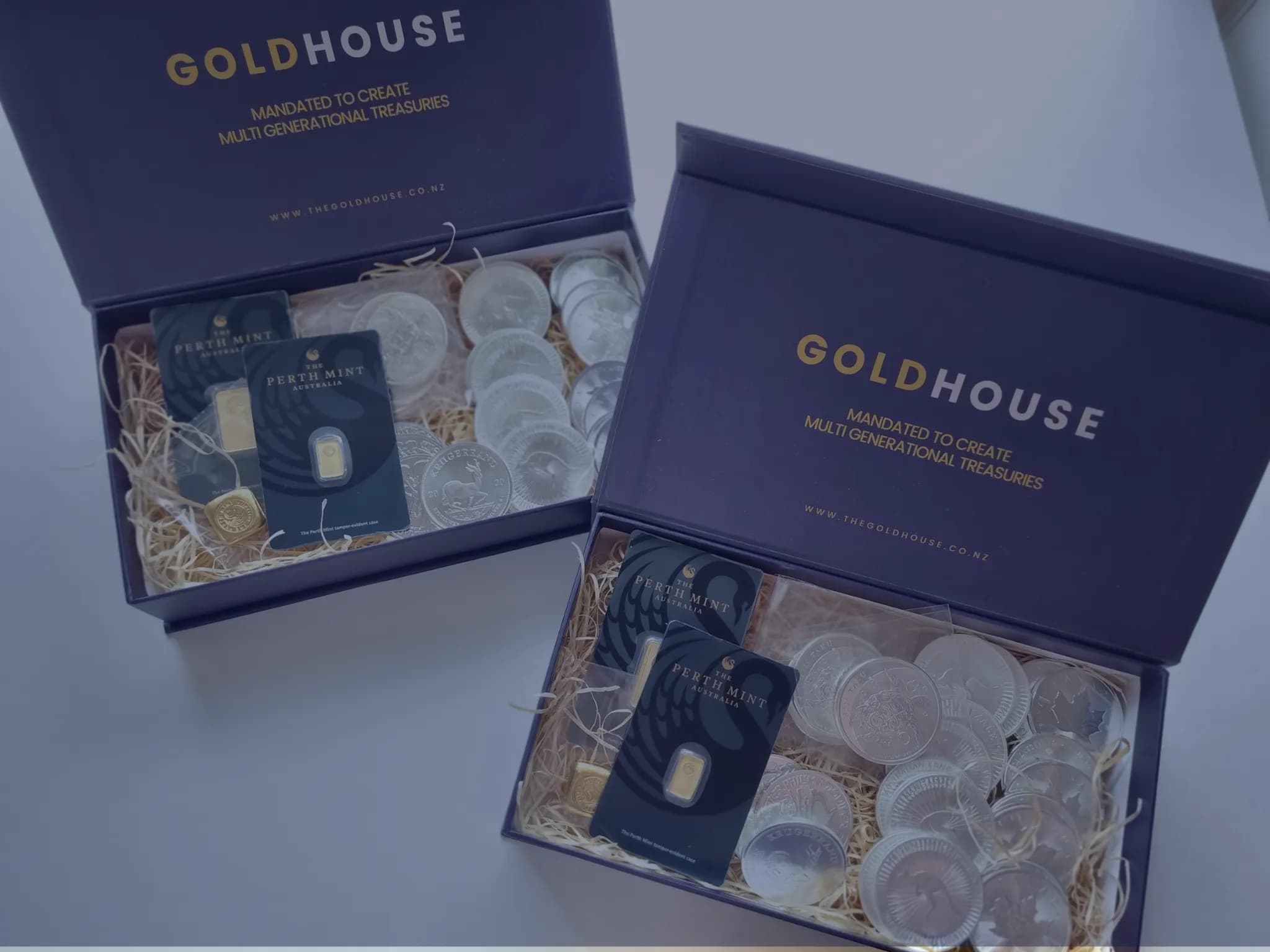 The Gold House® presentation boxes with gold bars and silver coins