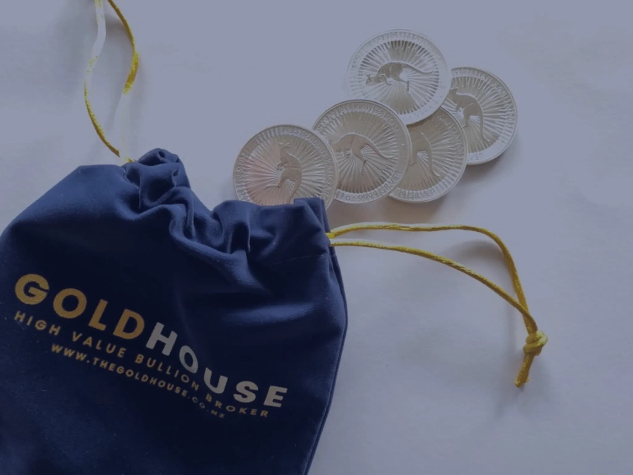 Australian Kangaroo one-ounce silver coins with a The Gold House® pouch