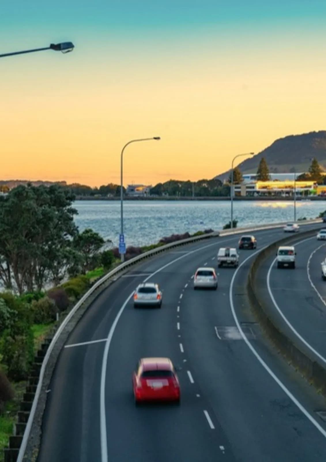 Harbour Link highway toward Mount Maunganui at golden hour in Tauranga