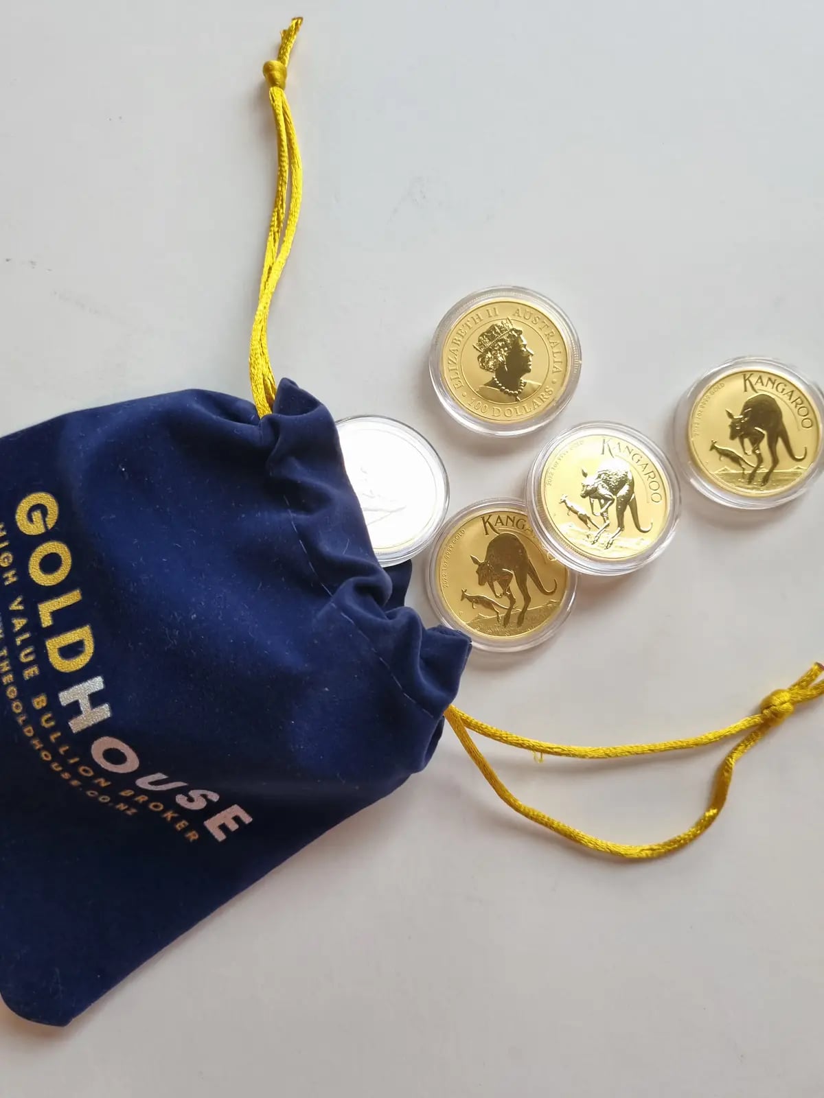 Gold bullion bars and coins from recognised mints